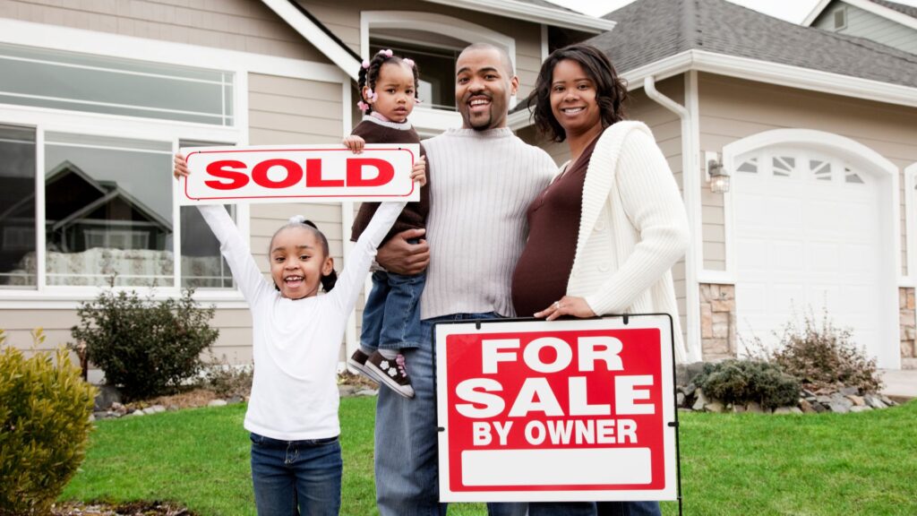 Happy family receiving home financing approval despite bad credit